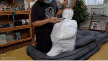 呼吸制御と口腔内虐待のMummification
